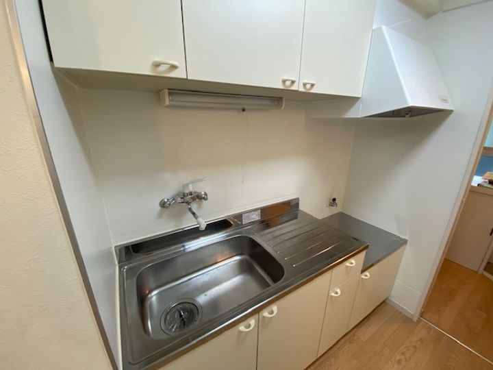 ロイヤルマンション上小出のキッチン