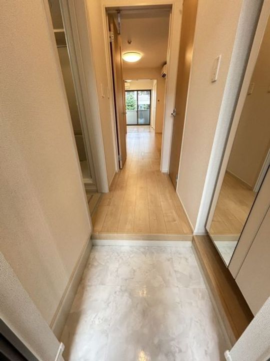 京都府京田辺市三山木西ノ河原の賃貸アパートの玄関