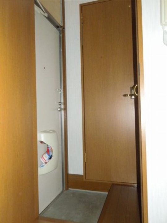 ホープ麻生6の玄関