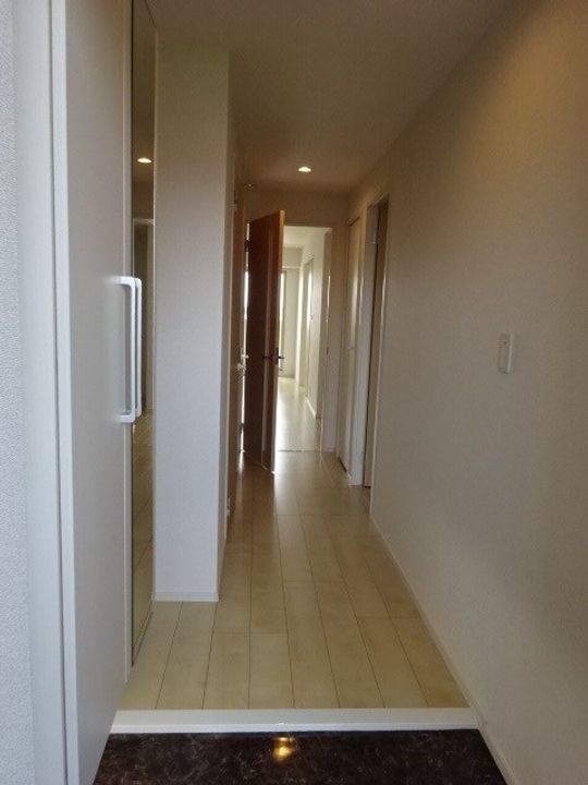 リベラ サンリット カーサの玄関