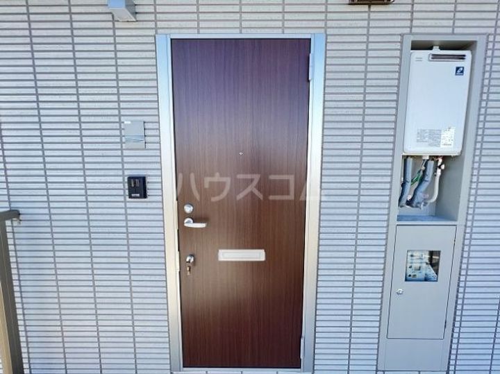 コンフォーティア八千代の玄関