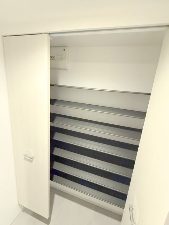 アルファスクエア菊水2条の玄関