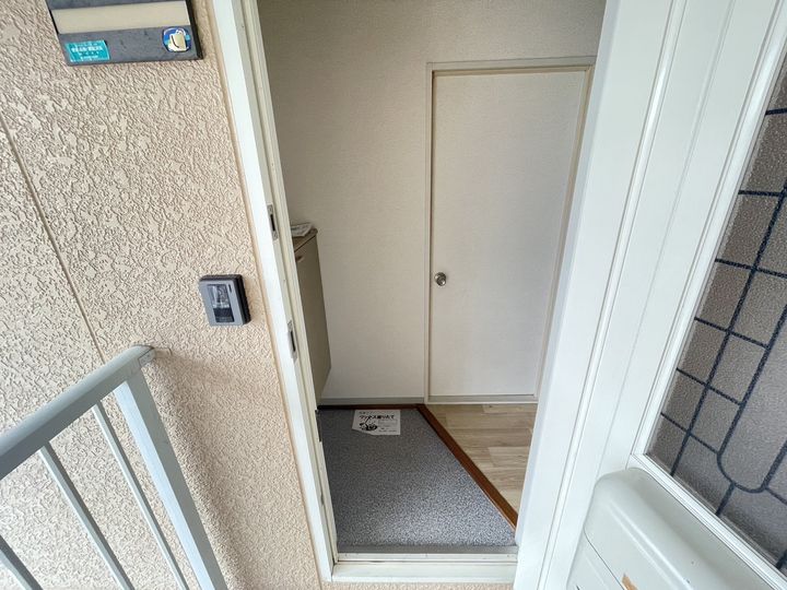 メゾン コスモスIIIの玄関