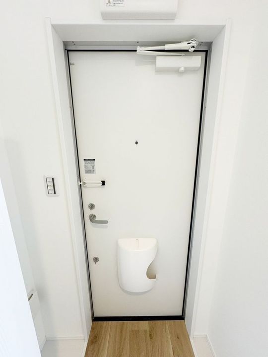 プレジール星久喜の玄関