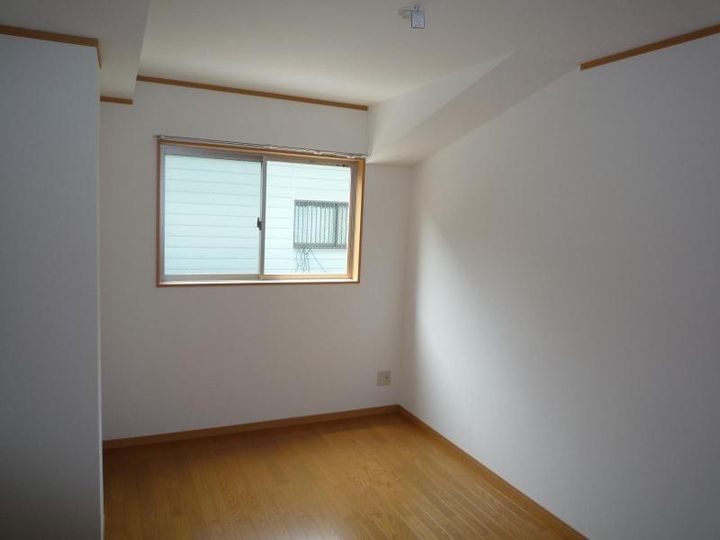 ベル・ウッドマンションの居間