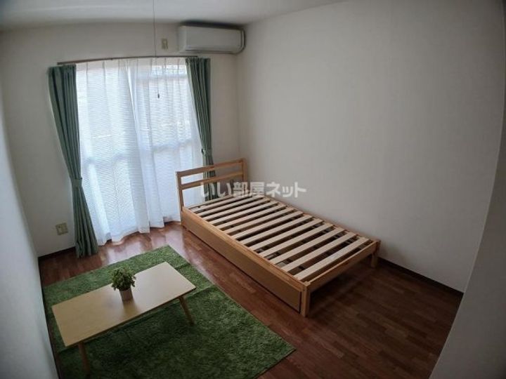 三重県名張市鴻之台3番町(マンション)の賃貸物件の居間