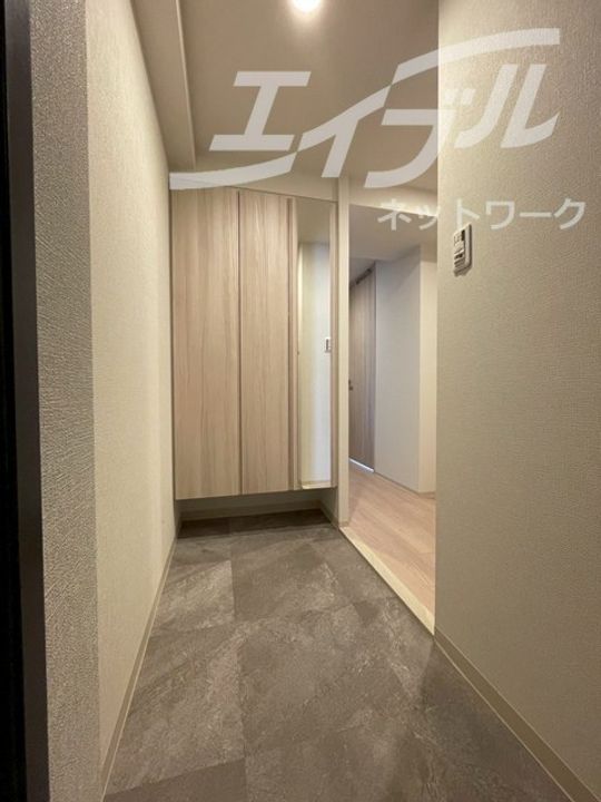 ファーストフィオーレ江坂垂水町IIの玄関