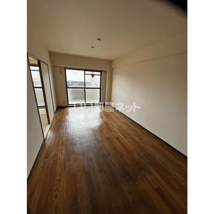 大阪府堺市西区浜寺石津町中1(マンション)の賃貸物件の居間