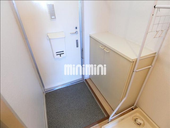 プレジール黒松の玄関