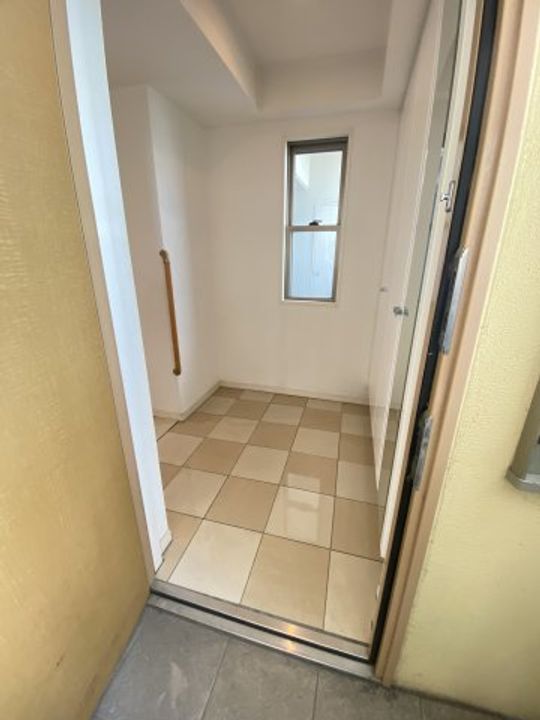 サンマンションシェフォール富田の玄関