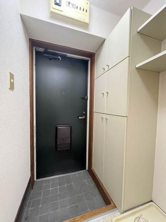 ミタカホーム11番館の玄関