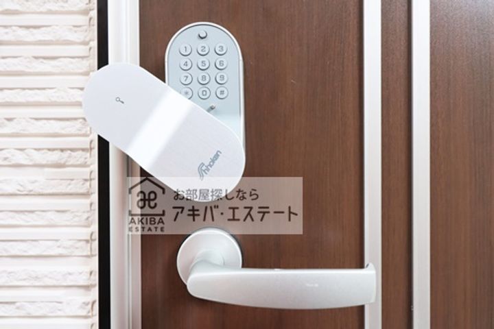ハーモニーテラス竹の塚IVの玄関