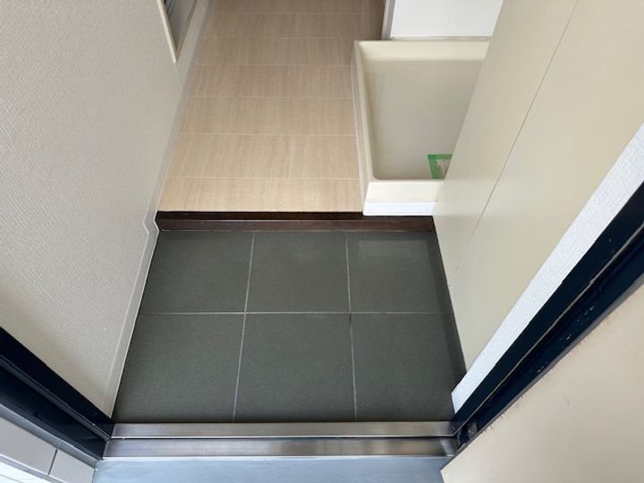 サンヒルズミヤケ倉本の玄関