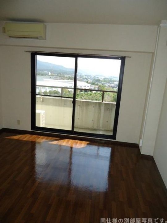 愛知県額田郡幸田町大字坂崎字西長根(マンション)の賃貸物件の居間