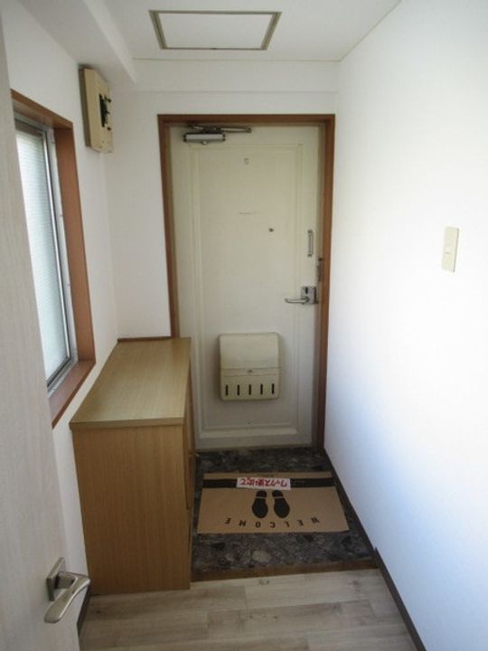 フレンドマンションの玄関