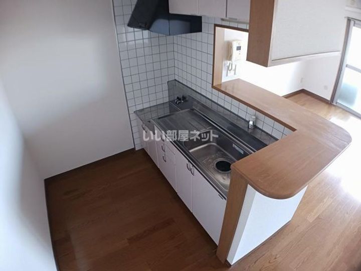 三重県名張市蔵持町原出(マンション)の賃貸物件のキッチン