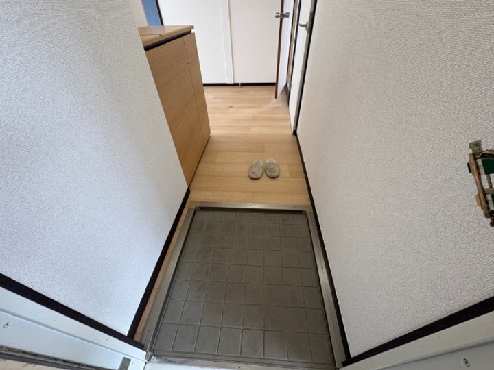 アーバン旭豊四季の玄関