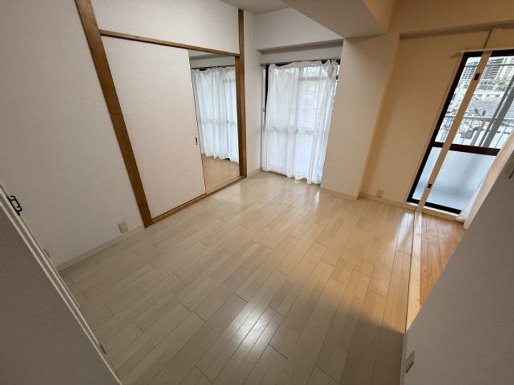 大阪府豊中市桜の町3の賃貸マンションの居間