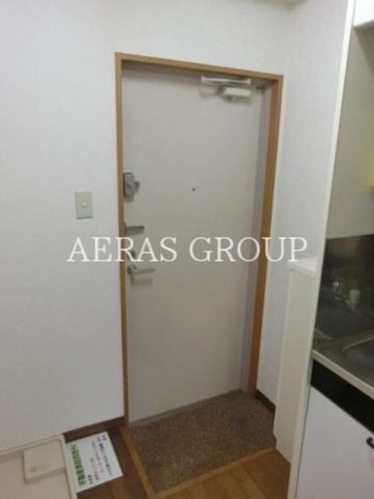 プライム王子神谷の玄関