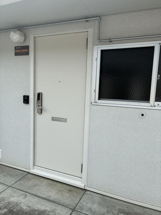 つつみコートの玄関