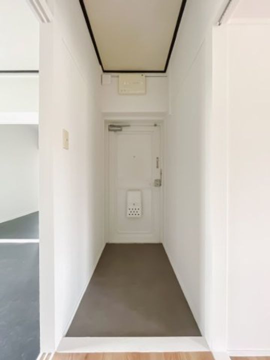 公社賃貸SMALIO 香里三井Bの玄関