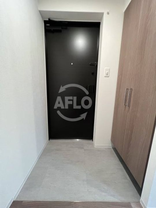 シーズンフラッツ新町の玄関