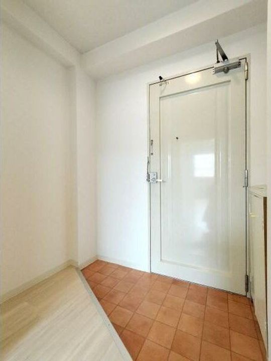 ルーミングハウス梶の玄関