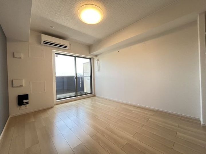 大阪府枚方市村野高見台の賃貸アパートの居間