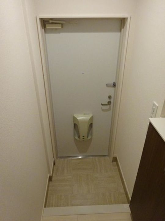 ハピネスIIの玄関