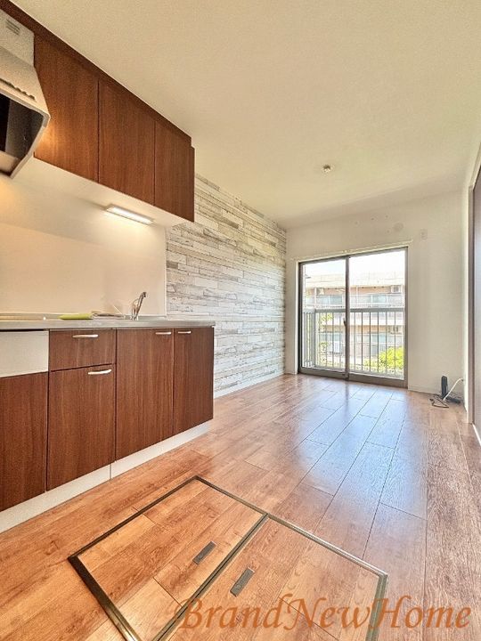 プレミアムスイート狭山駅前の居間