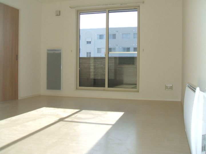 北海道札幌市北区北三十二条西10(マンション)の賃貸物件の居間