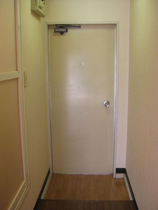 シティパレス上豊岡の玄関