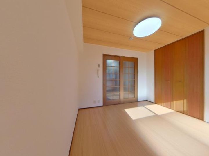 会津ロイヤルマンションの居間