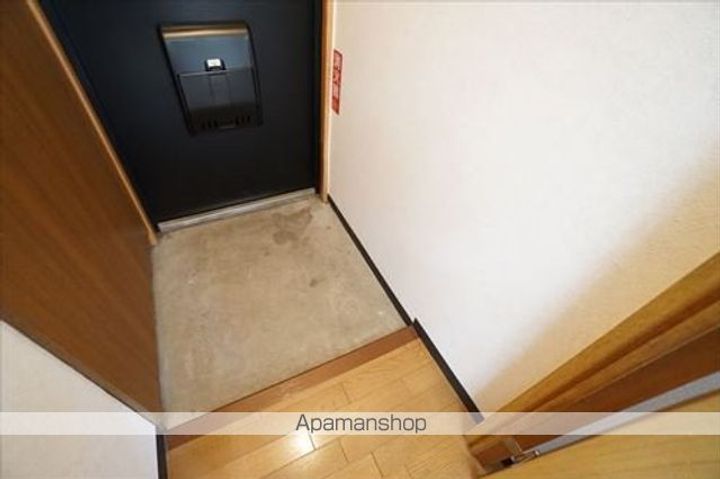 T・フラット1112の玄関