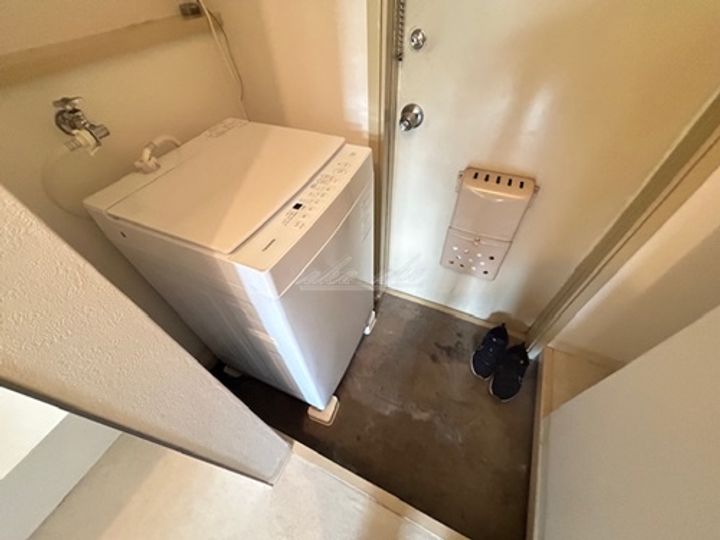 コスモ百合丘の玄関