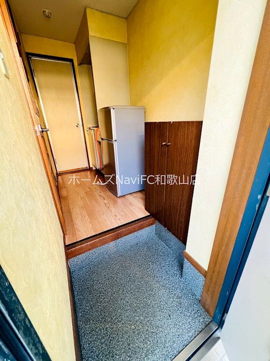 ロイヤルコーポ田尻の玄関