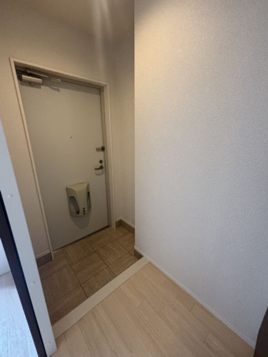 ハピネス1の玄関