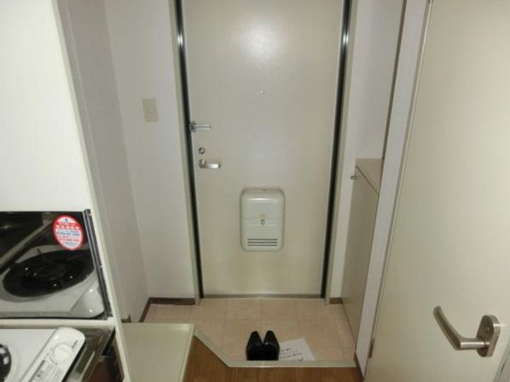 フェリス東生駒の玄関