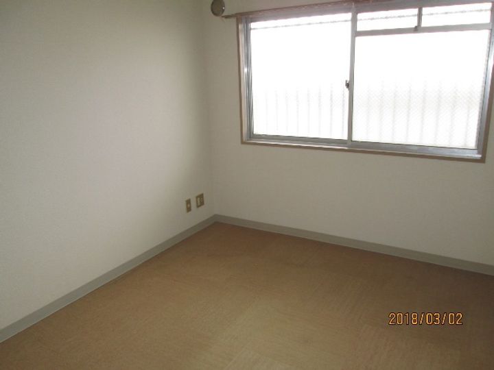 コーポ アダチの居間