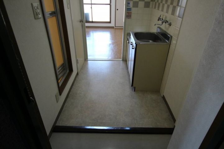 マンションデウミIIの玄関