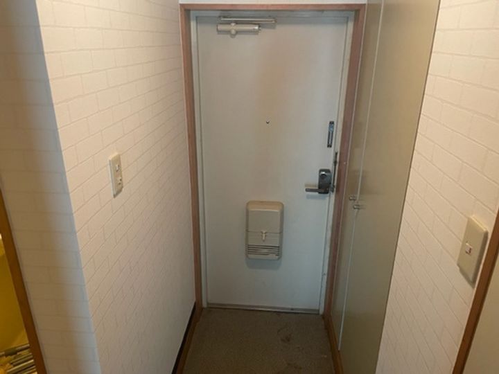 エスタシオン光町の玄関