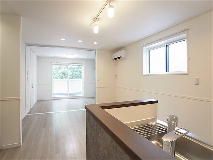 パサージュ八柱 203号室の居間