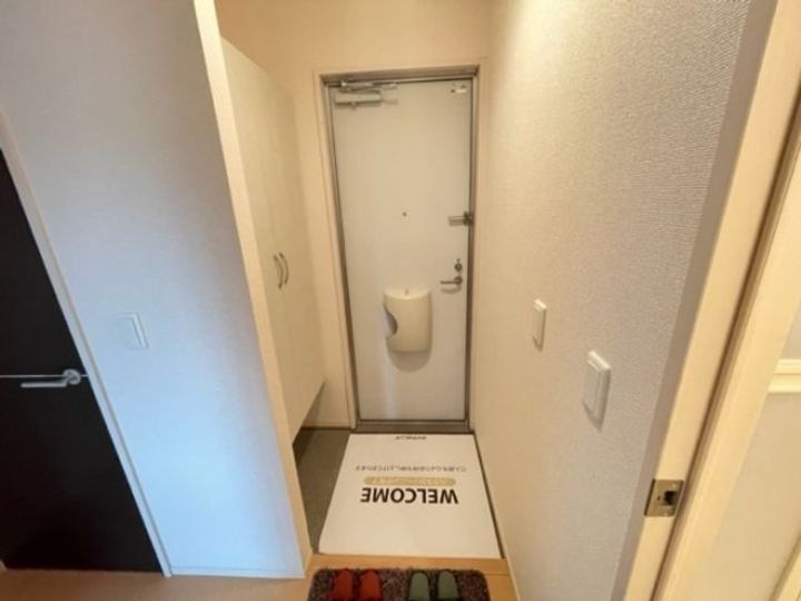 ジェネス 南佐賀の玄関