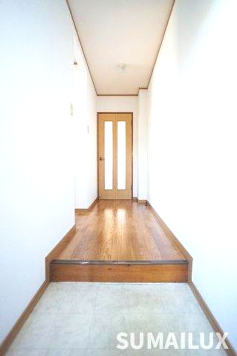 コーポリバーサイドの玄関