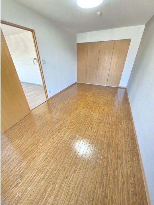 北海道札幌市白石区南郷通15丁目南(マンション)の賃貸物件の居間