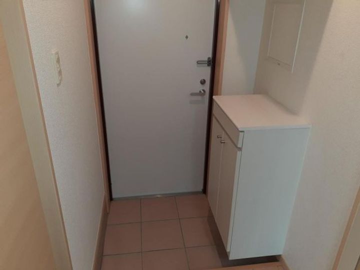 グラン サージュ コヤスの玄関