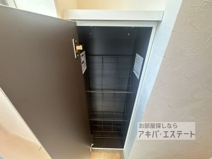 アザーレ・パッシオ中河原の玄関