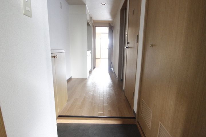 ウィルコートYONEKIの玄関