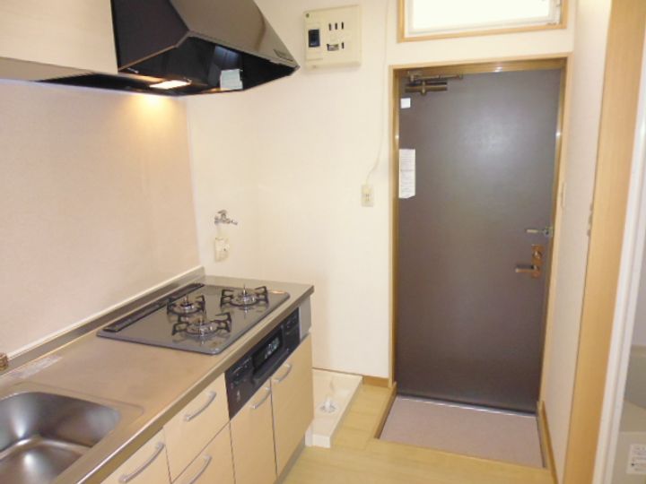 サニーライフ苦竹の玄関