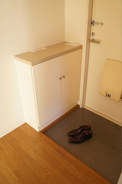 ルミエール大野芝の玄関